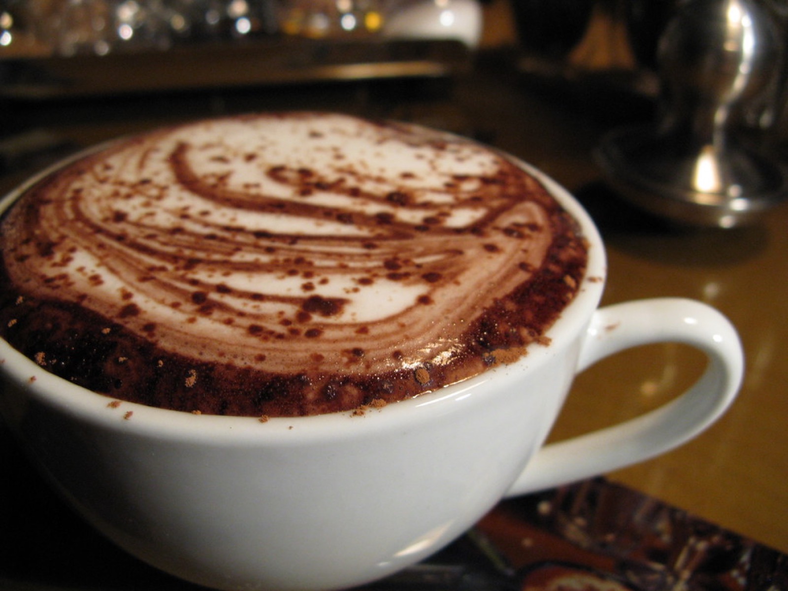 Coffee being poured into a cup