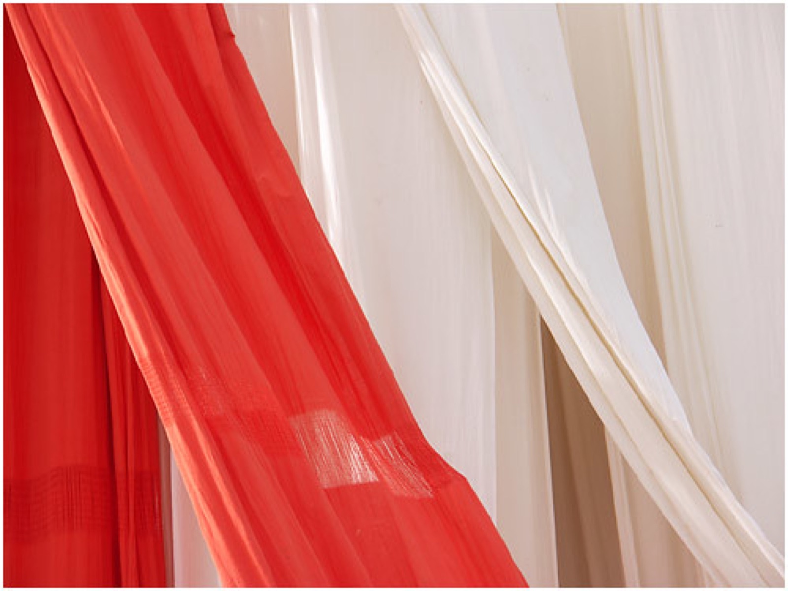 Brightly dyed fabric drying
